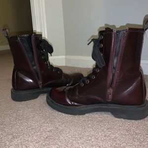 Lightly used pair of maroon combat boots.
